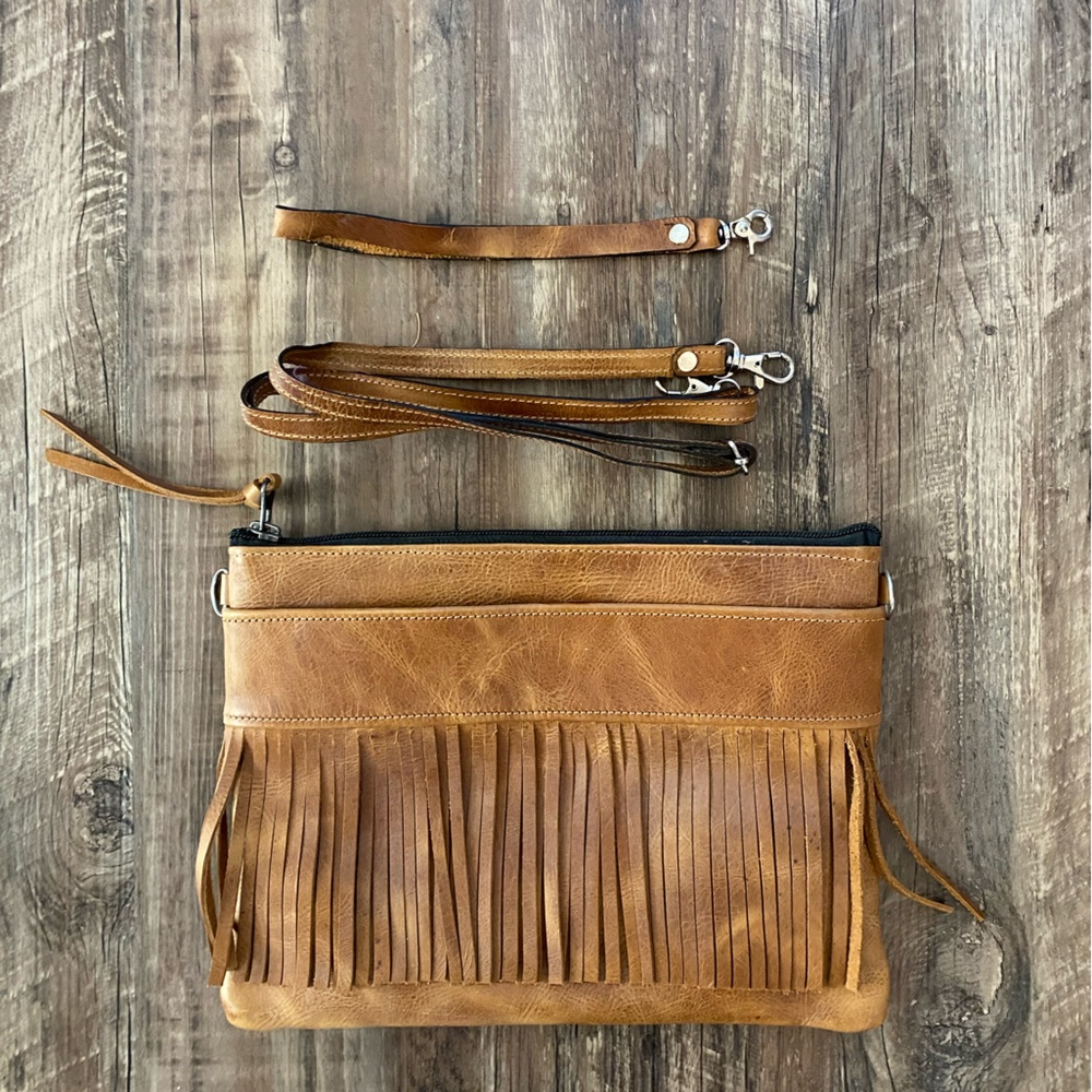 Brand new artisan leather fringe crossbody, clutch, and wristlet